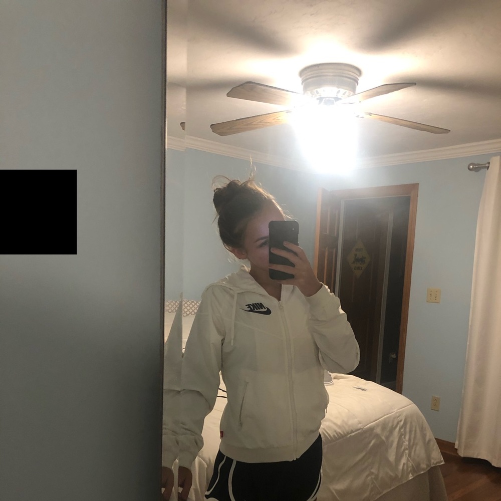 white Nike windbreaker